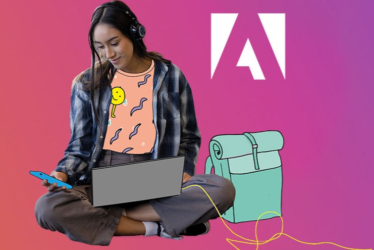 Student using Adobe on a laptop