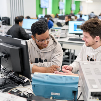 BEng Electrical engineering students working together 